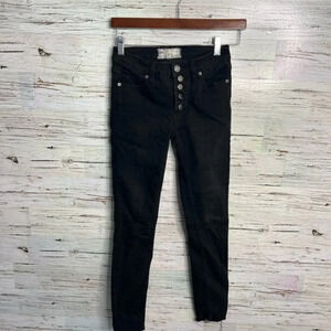 Free people black button fly skinny jeans  raw hem size 24